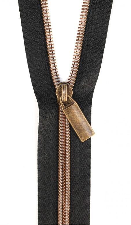 Black Nylon Coil Zipper with Antique Brass Pulls, Size 5, from Sallie Tomato