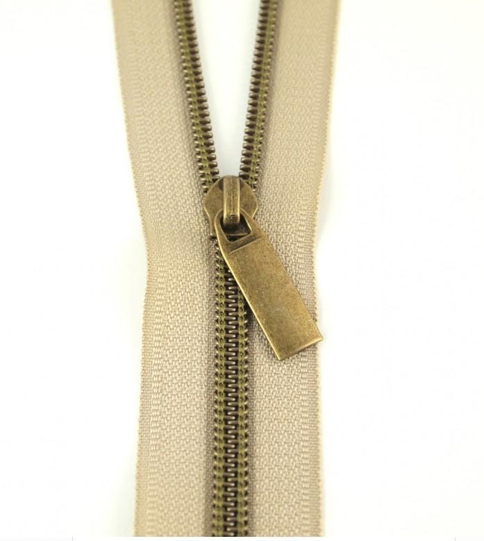 Beige Nylon Coil Zipper with Antique Brass Pulls, Size 5, from Sallie Tomato